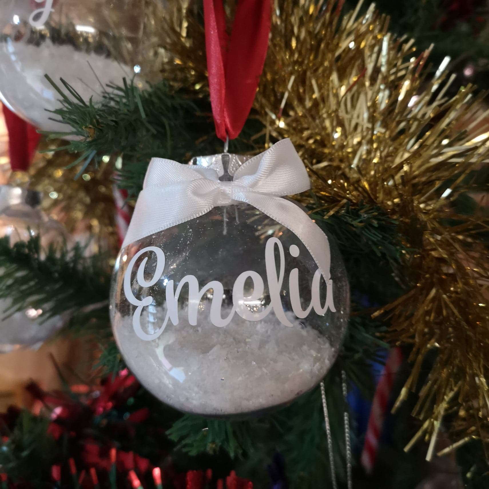 Personalised Christmas Bauble with name, snowflakes and ribbon from The Wrong End of Town