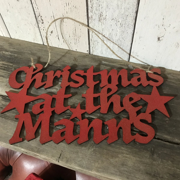 Christmas at the... family name sign
