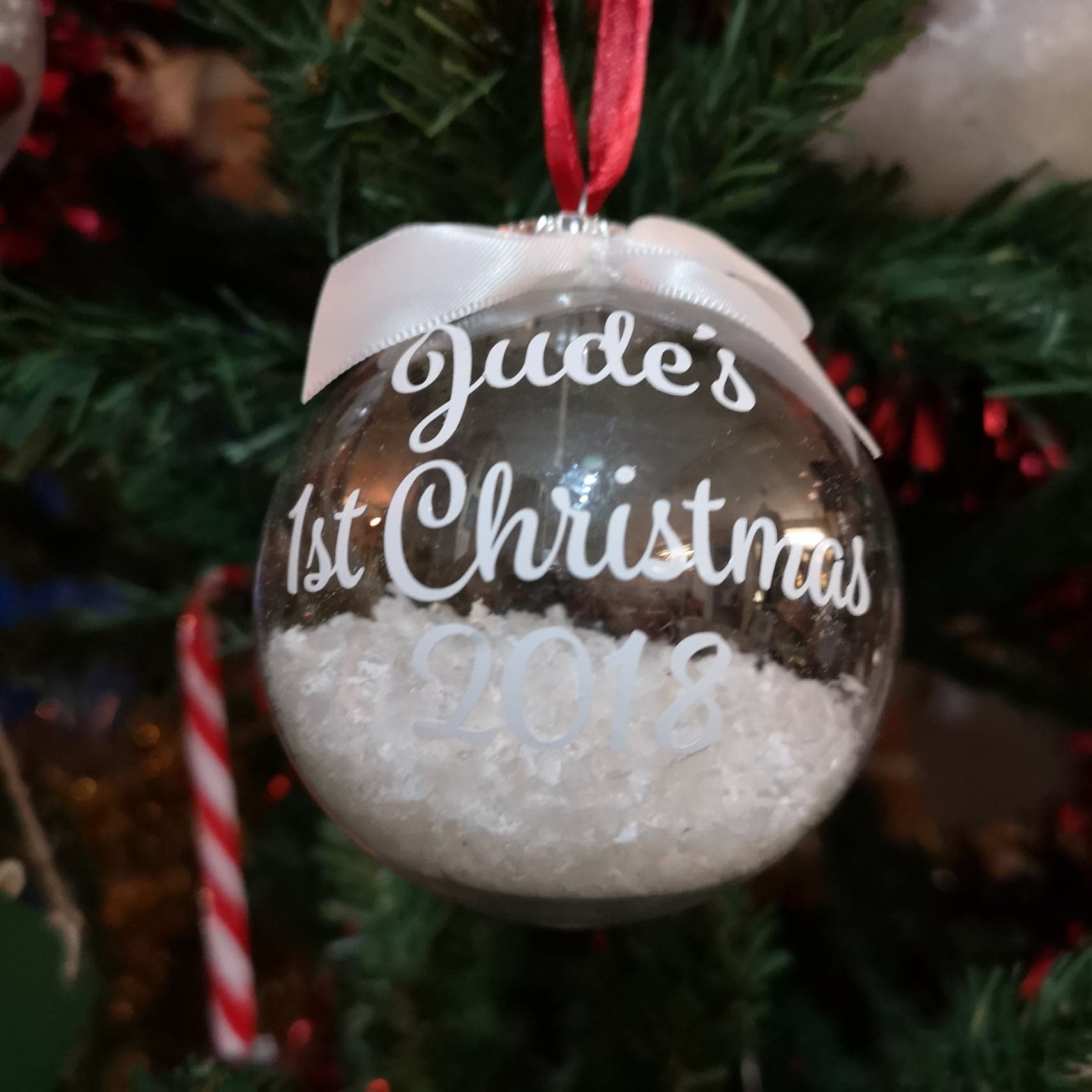 Personalised 1st Christmas Bauble with name, snowflakes and ribbon from The Wrong End of Town