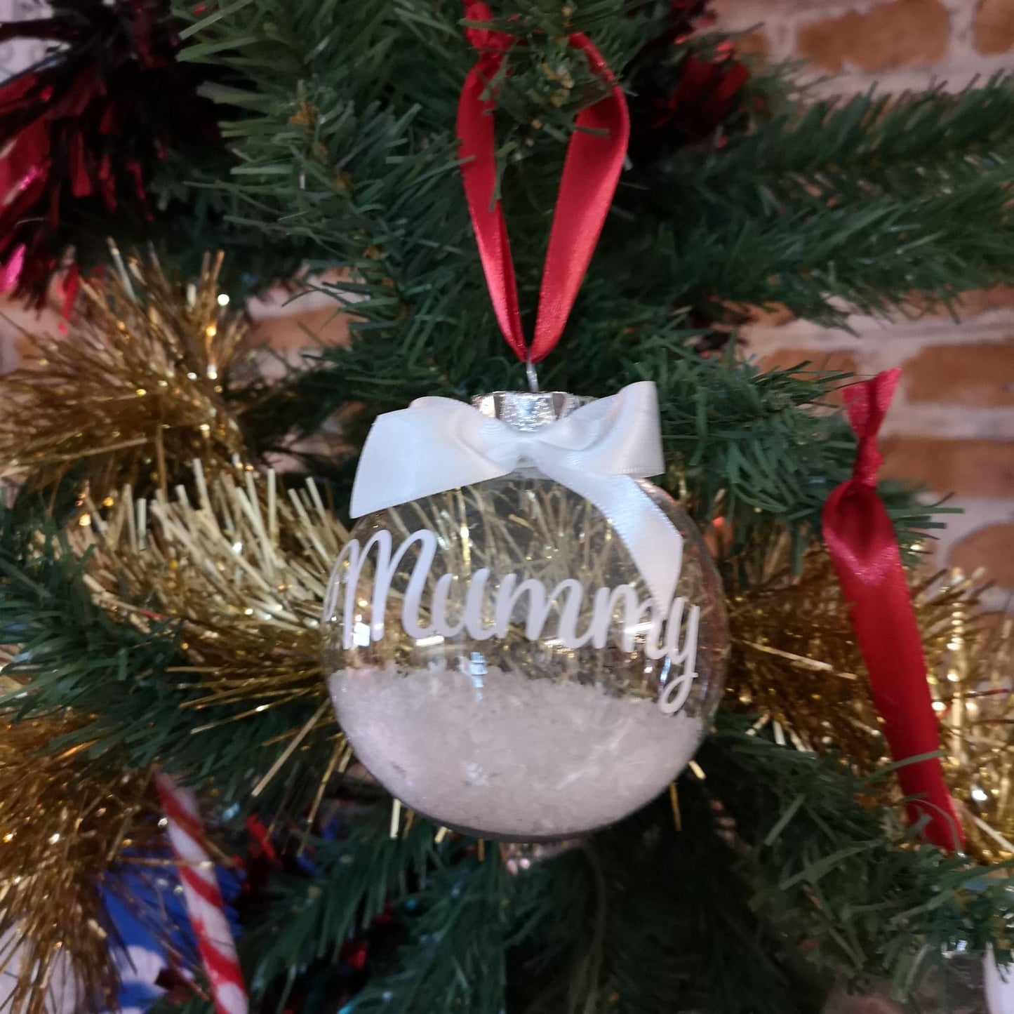 Personalised Christmas Bauble with name, snowflakes and ribbon from The Wrong End of Town